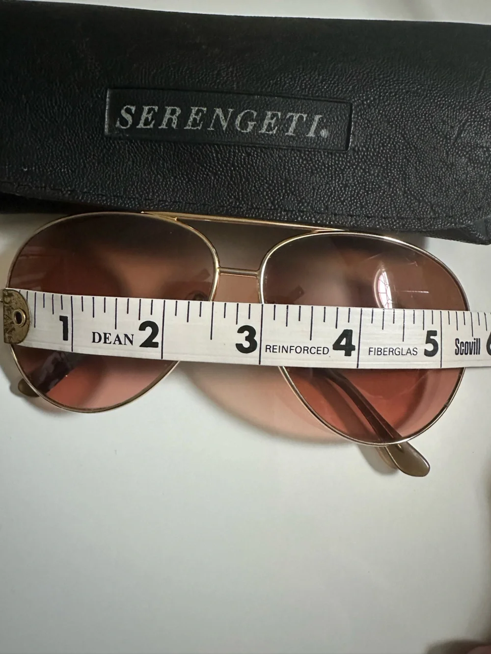 Serengeti Gold Aviator Sunglasses with Pink Lenses